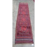 A Meshwani carpet runner. 2.4m x 0.6m