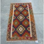 A Maimana Kilim rug. 1.34m x 0.80m