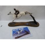 A sculpture by Jonathan Knight, Desert Orchid Jumping for Fun. Limited edition No. 7/275. With