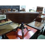 A 19th century mahogany dropleaf occasional table on tripod support. 25½' wide