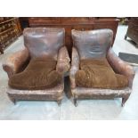 Two Edward VII leather upholstered club armchairs. Distressed