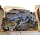 A case of military coats etc. and a case of linen