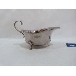 A George VI silver cream jug. Birmingham 1937. 6' long. 3ozs 4dwts