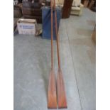A pair of vintage oars made by G.F. Winter, Eton, Windsor. 110½' long
