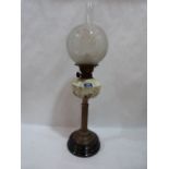 A Victorian oil lamp with etched shade and opaque glass fount on brass columnar support. 25' high