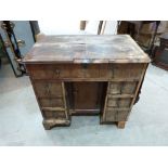 An early 18th century walnut kneehole dressing table in need of conservation. 31' wide