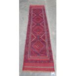 A Meshwani carpet runner. 2.41m x 0.62m