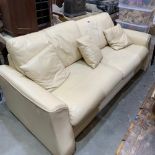 A G-Plan cream leather sofa. 83' wide