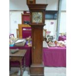 An 18th century oak longcase clock of 8 day duration, the 10' dial with silvered chapter ring signed