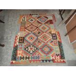 A Vegetable dyed wool Choli Kelim rug. 1.42m x 1.06m