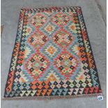 A Choli Kilim rug. 1.4m x 1.06m