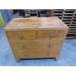 An oak Air Ministry chest of two short over two long drawers. 35½' wide