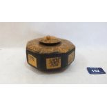 A Chinese carved treen octagonal inkwell. 4¼' diam