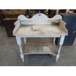 A Victorian painted pine washstand, the top with shaped gallery. 38' wide