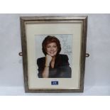 An autographed and inscribed photograph of Cilla Black. Framed