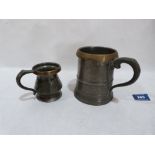 Two 19th century Victorian pewter pint and gill mugs with brass rims