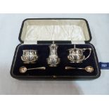 A George V cased silver cruet set by Walker & Hall. Birmingham 1922. 2ozs 13dwts