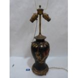 A Japanese ceramic table lamp on gilt metal base