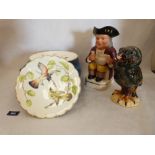 Six Royal Worcester Dorothy Doughty plates, a bird jar and cover in the style of Martin Brothers and