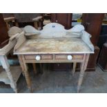 A Victorian pine and painted washstand with shaped gallery top and a pair of frieze drawers. 37'