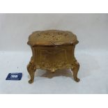 A 19th century French ormolu jewellery casket with blue silk lining. 4¾' wide