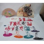 A collection of Chinese paper cut outs and three fans, the lot to include a rice-picker's hat
