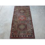 An eastern style rug. 72' x 36'