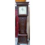 An oak 30hr longcase clock, the painted dial signed Pearson, Halifax, the case with carving added