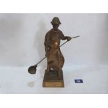 A bronze figure of a metal worker. Marked Partnerschaftbegegnung Juni 2001. 11½' high