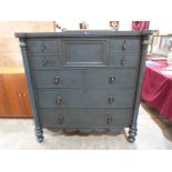 A painted Scottish chest with an arrangement of four short drawers over three long drawers, on