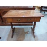 A Victorian oak side table with a frieze drawer on lyre end standard supports. 33' wide