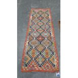 A Choli Kilim carpet runner. 1.9m x 0.7m