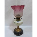 A Victorian oillamp with milch-glass fount painted with flowers and ruby flashed acid etched