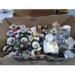 A collection of miniature character jugs, Royal commemorative ceramics etc.