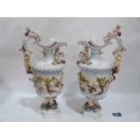 A pair of late 19th century Naples Capodimonte ewers. 16' high