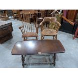 A stickback rocking chair; a smoker's bow armchair and an Ercol style coffee table