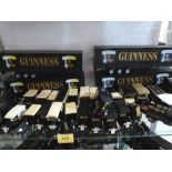 A collection of Guinness themed diescast model vehicles