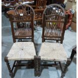 A pair of wheelback chairs and a pair of rush seated chairs