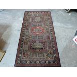 An eastern style rug. 72' x 36'