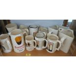 A collection of Guinness water jugs and mugs