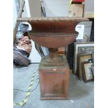 A Victorian Terracotta country house urn on square socle base. 50' high