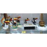 Six Royal Doulton Guinness toucans, a Minton's matchbox stand and a ceramic box with cover