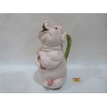 A novelty ceramics jug in the form of a pig. 10¾' high