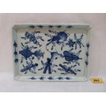 A Chinese rectilinear blue and white decorated dish. 9¼' wide