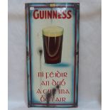 An enamel Guinness advertising sign in Gaelic. 36' high