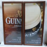 A pair of framed Guinness advertising posters. 33' x 14'