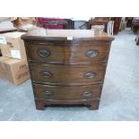 A 19th century mahogany bowfronted chest of three long drawers on bracket feet. 29½' wide