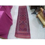 A Meshwani carpet runner. 2.41m x 0.62m