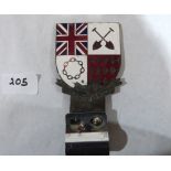 A Monte Carlo Rally competitor's badge, the motto reading PER ARDUA AD SOLEM. Made by Spencer,