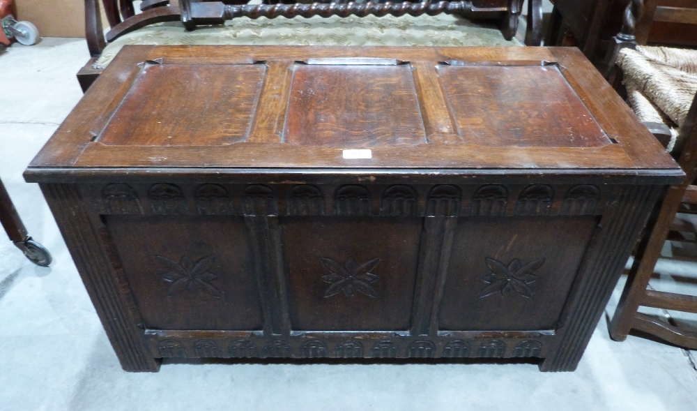 An oak three panel blanket chest. 36' wide